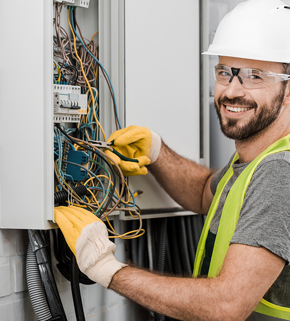 Residential Electrician working in a panel