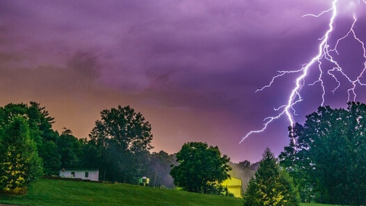 lightning outside of a house