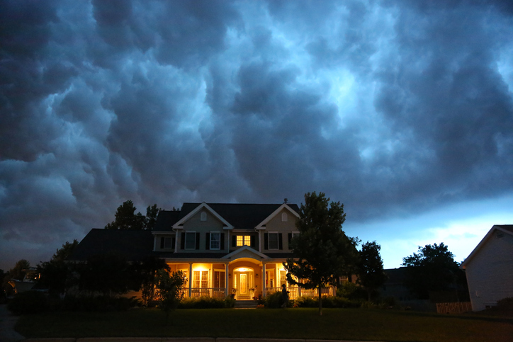 Well-lit home in severe summer thunderstorm