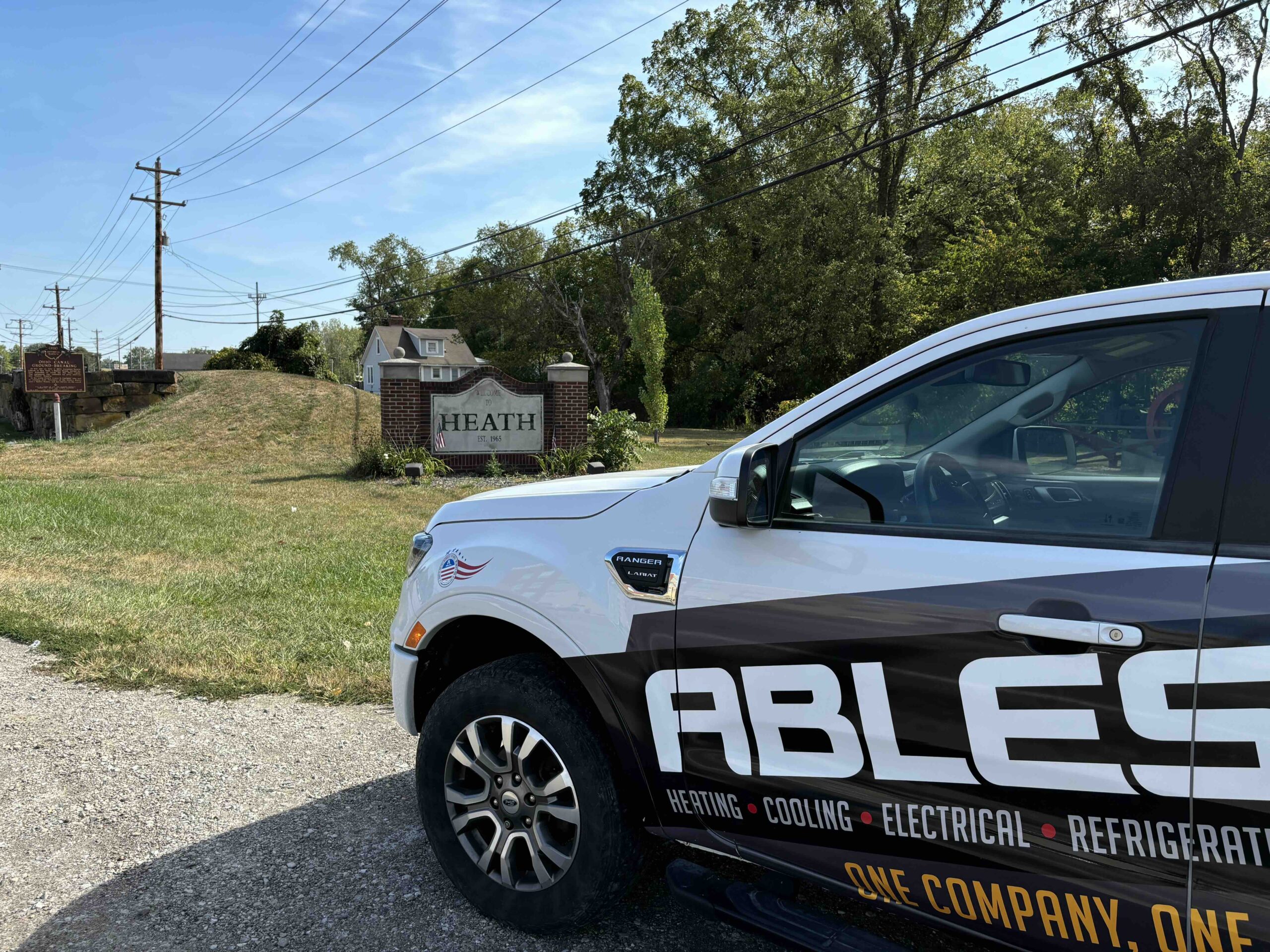 Entrance to Heath OH, with Ables HVAC Truck